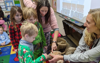 Mrs. Whiting's Class with Woolly Mammoth Bones in 2019-20